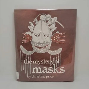 May include: A book cover with a red background and a black and white illustration of a mask. The title of the book is "The Mystery of Masks" by Christine Price.