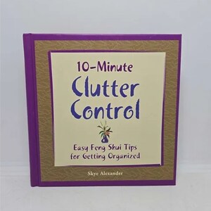 May include: A purple and brown book titled "10-Minute Clutter Control: Easy Feng Shui Tips for Getting Organized" by Skye Alexander.
