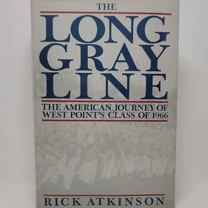 May include: A book cover with a white background and blue text. The title is "The Long Gray Line: The American Journey of West Point's Class of 1966". The author is Rick Atkinson.
