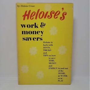 May include: A yellow book cover with the title "Heloise's work & money savers" in red and black text. The book cover features a floral design and the text "Heloise is back with HINTS, TRICKS and TIPS on how to save TIME, MONEY and ENERGY in and out of the HOME, at WORK or at PLAY."