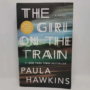 The Girl on the Train Paperback – August 31, 2021 by Paula Hawkins - A #1 Globe and Mail and New York Times BestsellerNamed a Best Book of