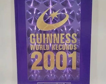 Guinness World Records 2001 Library Binding – September 1, 2000 by Tim Footman (Editor), Guinness Media (Editor) Vintage Trivia Reference