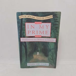 May include: Book cover with a green forest background and the title "In My Prime: Meditations for Women in Midlife" by Ellen Suf Stern.
