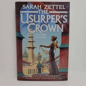 May include: Book cover for "The Usurper's Crown" by Sarah Zettel. The cover features a woman in a long, flowing dress standing in front of a colorful, fantastical city. The title of the book is in large, bold letters.