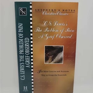 May include: A book cover with a gold background and a black and white photo of a pen and paper. The title is "C.S. Lewis's The Problem of Pain/ A Grief Observed" and the subtitle is "The Most Concise and Accurate Way to Grasp the Essentials".