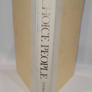 May include: A white book with the title "Choice People" by A.E. Hotchner and the publisher Morrow printed in gold lettering.