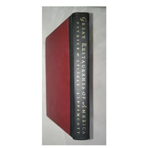 May include: A red hardcover book with a black spine. The spine has gold lettering that reads "Great Restaurants of America" and "Patrick & Spitzer / Lippincott".