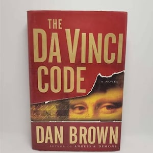 The Da Vinci Code Hardcover – April 1, 2003 by Dan Brown Book 2 of 5: Robert Langdon As millions of readers around the globe have alrea