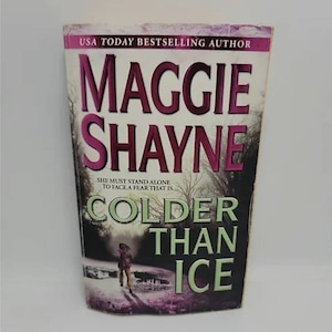 Colder Than Ice (Mordecai Young Series, Book 2) Mass Market Paperback – 2005 by Maggie Shayne Seventeen years ago, government agent