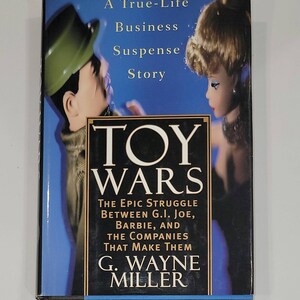 Toy Wars: The Epic Struggle Between G.I. Joe, Barbie, and the Companies that Make Them Hardcover – January 15, 1998 by G. Wayne Miller