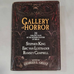 May include: A book cover with a dark background and a gothic design. The title is "Gallery of Horror" and the authors are Stephen King, Eric Van Lustbader, and Ramsey Campbell. The book is edited by Charles L. Grant.