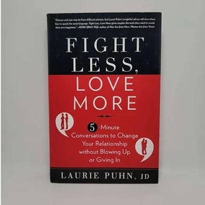 May include: Book cover with a red background and the title "Fight Less, Love More" in black text. The subtitle is "5-Minute Conversations to Change Your Relationship without Blowing Up or Giving In". The author's name is "Laurie Puhn, JD".
