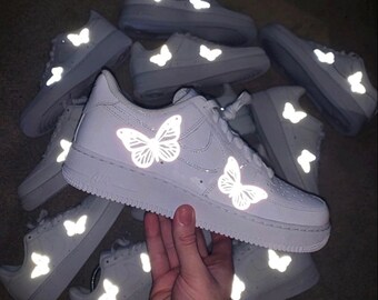 white nike air force with butterflies
