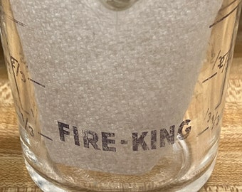 Vintage Fire King #496 8 ounce Glass measuring cup, D handle with spout, black lettering