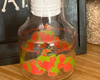 Strawberry Shortcake Anchor Hocking Carafe, 9’ tall, Life is full of sweet surprises. Vintage Carafe