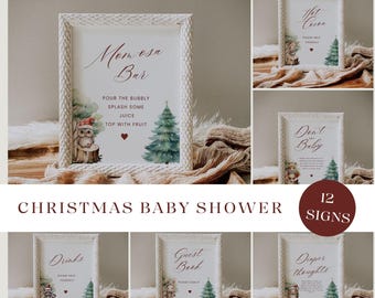 May include: Twelve printable Christmas baby shower signs featuring a woodland owl and a Christmas tree design. The signs include "Mimosas Bar", "Drinks", "Guest Book", "Don't Forget Baby", "Diaper Thoughts", and "Hot Cocoa".