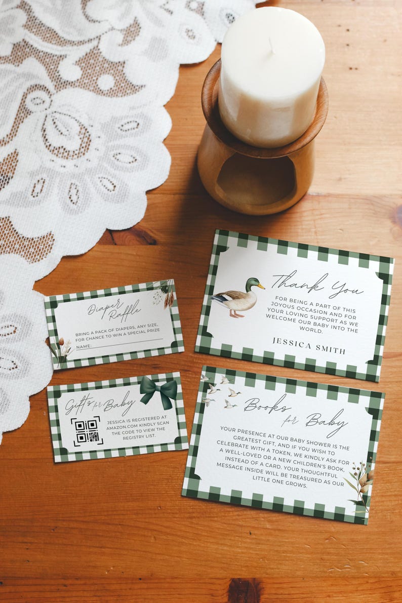 May include: Four green and white gingham baby shower cards with floral and duck illustrations. The cards include a diaper raffle, a gift registry QR code, a thank you message, and a request for books instead of cards.