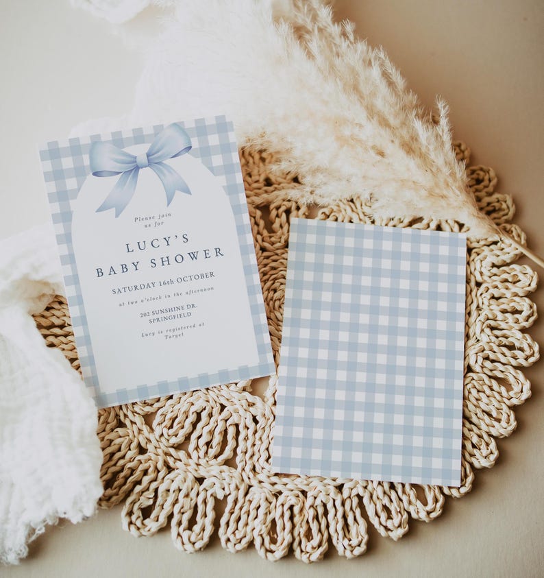 May include: A blue and white gingham baby shower invitation with a blue bow and the text "Lucy's Baby Shower" and "Saturday 16th October".