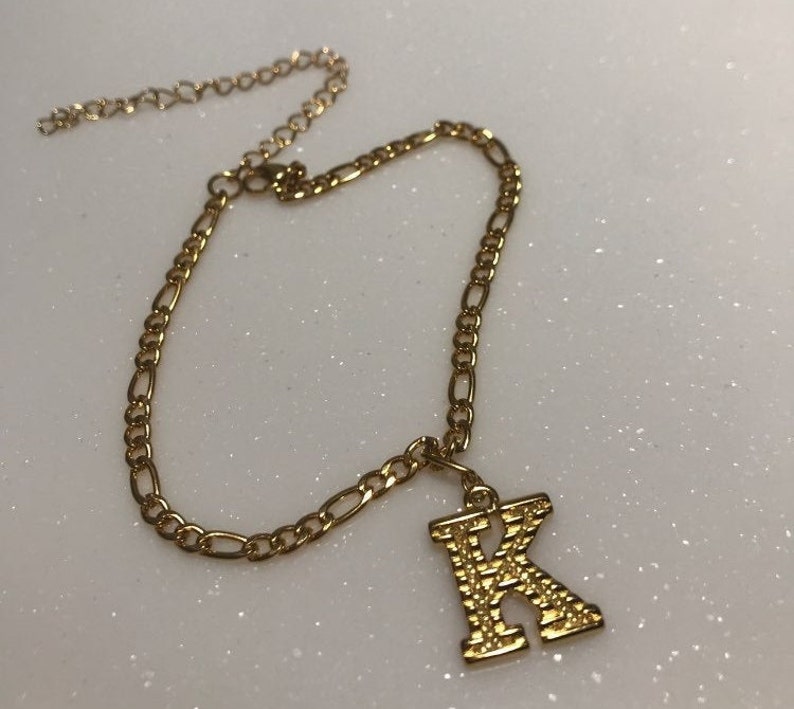 r initial anklet