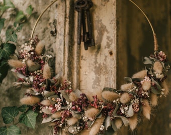 Dried flower wreath with Lagurus and beautiful berry tones