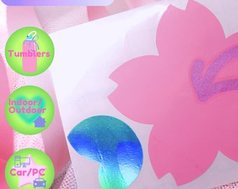 May include: Pink cherry blossom flower sticker with iridescent green leaves. The sticker is waterproof and UV resistant.  Tumblers, indoor/outdoor, car/PC.