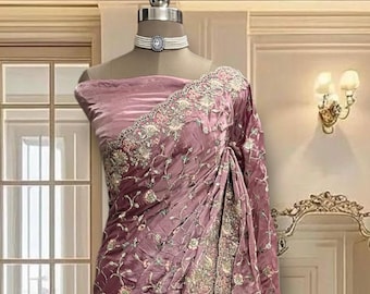 Onion pink satin saree with glitter work and cutwork border, includes a running blouse piece