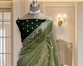 Pastel green organza Saree, Gold Scalloped Border, includes unstitched contrast blouse