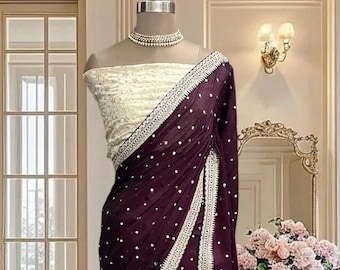 Wine satin Georgette saree with zari butti and delicate border, includes offwhite Blouse Piece