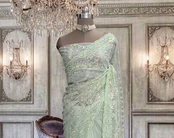 Beautiful Dull Green Net Saree With Zari and Stone Work and Running Blouse  Piece 