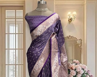 Purple satin silk saree with subtle zari border and running blouse piece