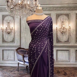 Purple pure satin saree with kundan work and running blouse piece