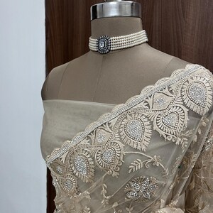 TCR Beige Net Saree With Thread Embroidery Work!