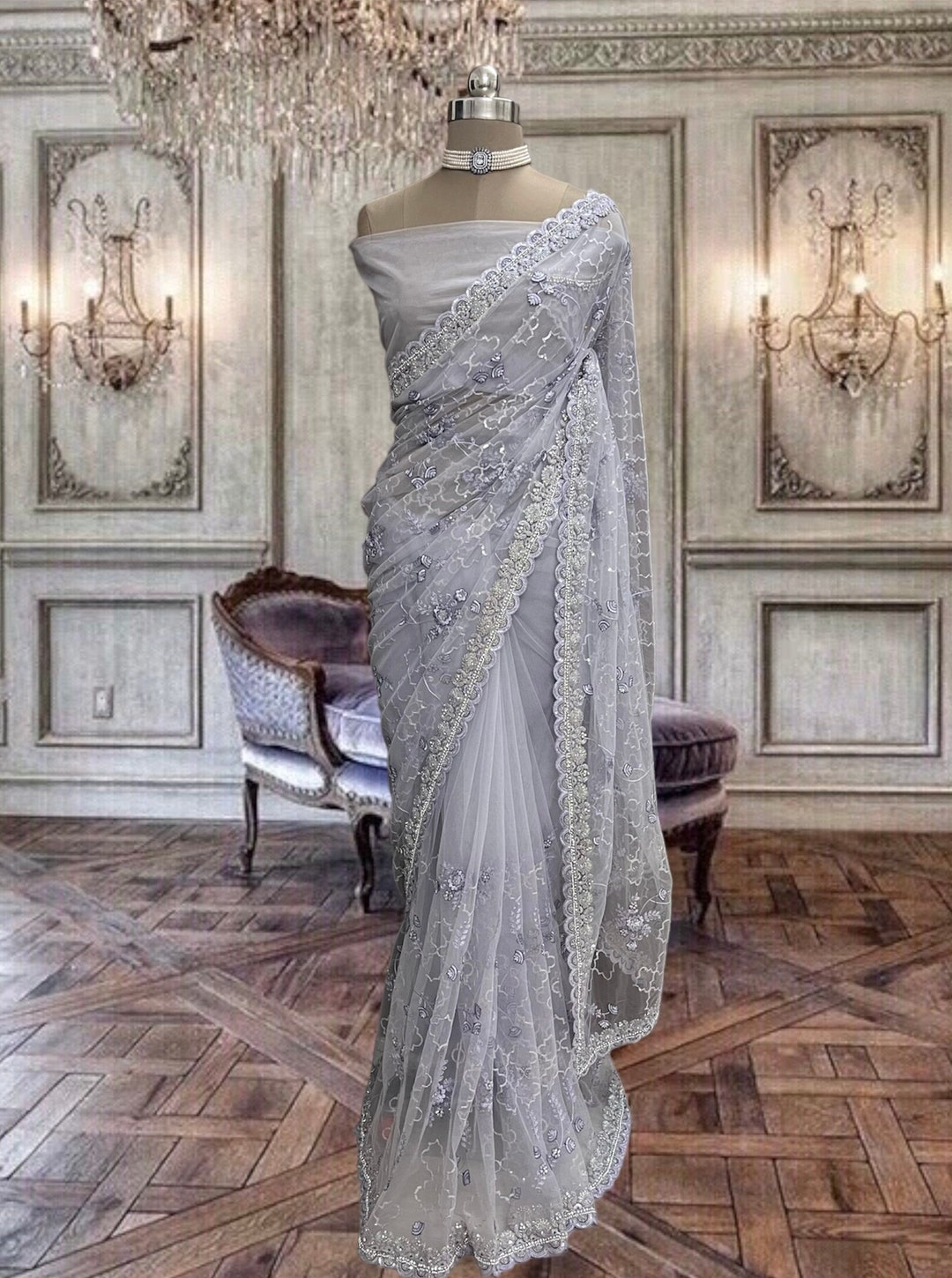 Women's Net Lavendar Embellished Designer Saree With Blouse Piece