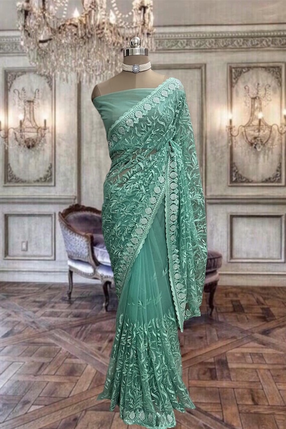Aqua Green Net Saree With Stone Work and Running Blouse Piece