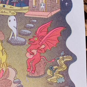 May include: A red devil with wings plays a guitar while sitting on a tree stump. The devil has a large, red, pointed tail. The scene is set in a forest with a small cabin in the background.