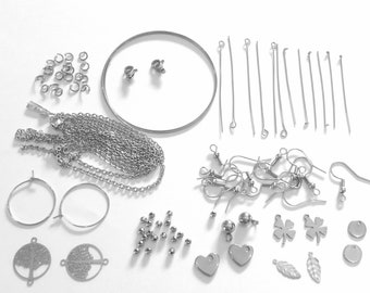 Kit creativo para hacer joyas de acero inoxidable. 15 piezas diferentes: pendientes, pulseras, collares.