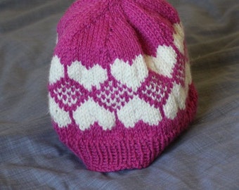 Fair Isle 100% Wool Heart Hat. Hand knitted in Orkney. Made with pure wool as an Aran knit so lively and warm.