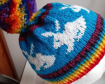 Hand knitted Rainbow Rabbit Hat - fun, warm and colourful. Ideal for bunny lovers of all ages!