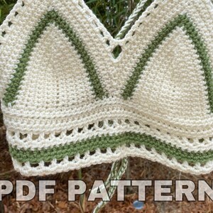 May include: Crochet halter top pattern in white and green yarn. The pattern includes a PDF download.  PDF PATTERN.