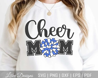 May include: White sweatshirt with the text "Cheer Mom" in black with a blue and white pom-pom graphic.