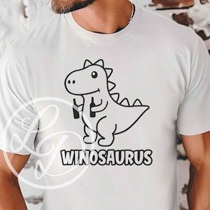 May include: White t-shirt with a black and white cartoon dinosaur holding two wine bottles. The text "Winosaurus" is printed below the dinosaur.