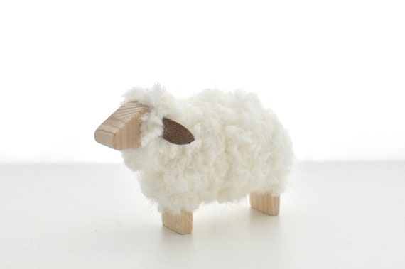 wooden sheep with wool