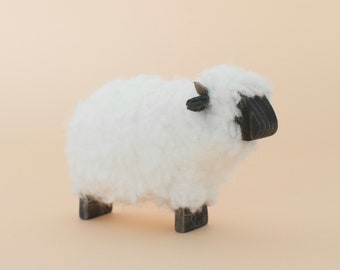 Wooden sheep "Walliser Schwarznase" (Valais Blacknose) with faux wool fleece, spirit animal