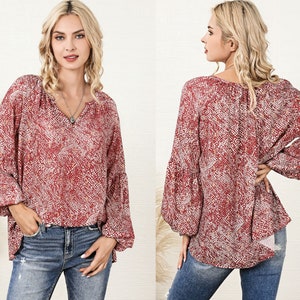 blusa negra de gasa para mujer