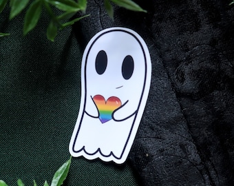 Spooky ghost sticker holding a rainbow heart | lgbt stickers and pride month artwork | Cute gothic stationary | Bisexual, lesbian, and gay