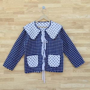 Jaqueta acolchoada índigo feita à mão, casaco reversível de algodão com estampa em blocos.