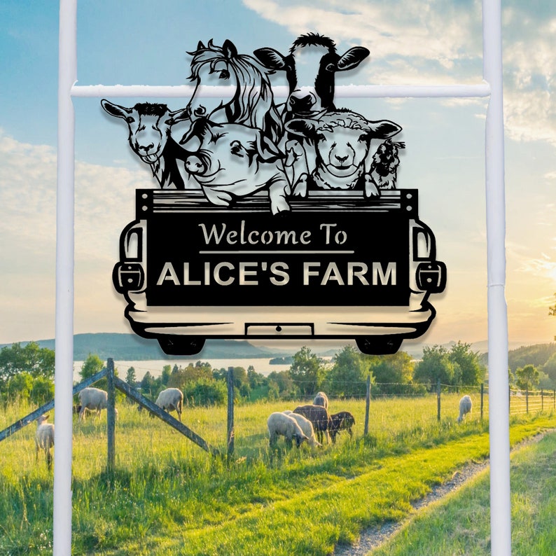 May include: Black metal silhouette of a pickup truck with a variety of farm animals peeking over the side. The truck bed has a sign that reads "Welcome to Alice's Farm".