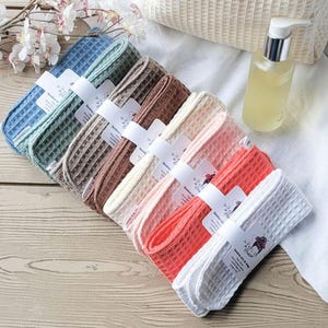 Set 9 Pezzi Fasce Per Capelli Morbide + Braccialetti Assorbenti | Per Trucco, Doccia, SPA E Cura Della Pelle | Microfibra Elastica, 3 Colori - 3