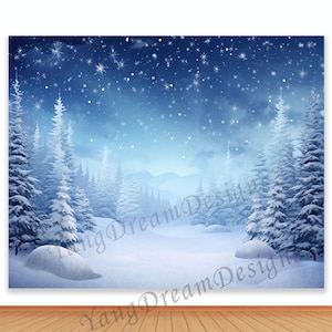 May include: A winter scene backdrop with snow-covered fir trees, a snowy ground, and a starry night sky. The backdrop has a blue and white colour scheme, with a hint of mountains in the background. The words "Yang Dream Design" are visible.