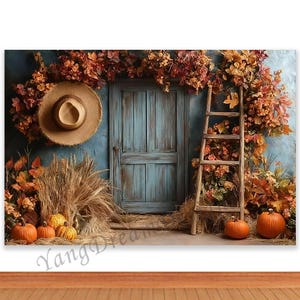 May include: A rustic backdrop featuring a weathered blue door, a wooden ladder, and autumn foliage. A straw hat hangs on the wall, with pumpkins and hay bales at the base. The image evokes a fall harvest theme.